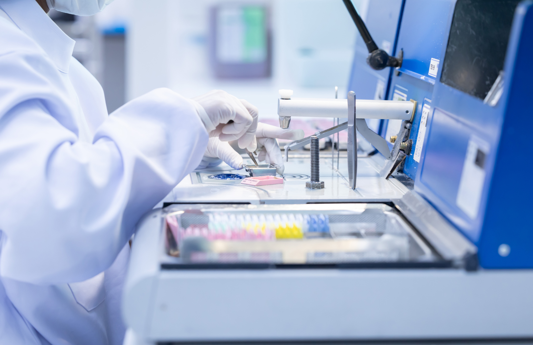 Researcher working with laboratory equipment